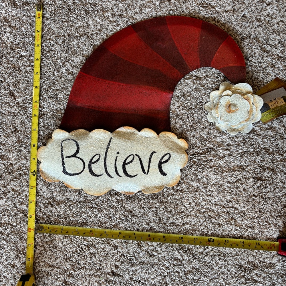 Charming Red and White Holiday Hat with 'Believe' Sign